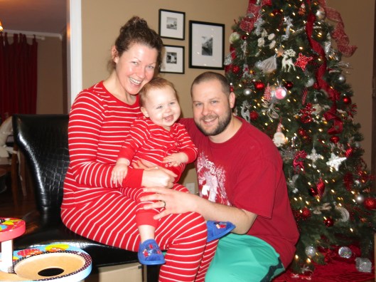 Christmas morning family pic.  Me and R have matching PJs! 