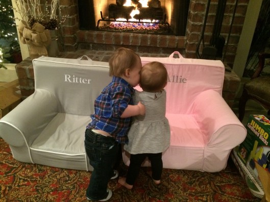 Giving kisses to cousin Allie on Christmas!  