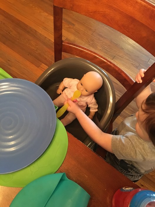 He loves caring for, feeding, changing, and rocking his babies!